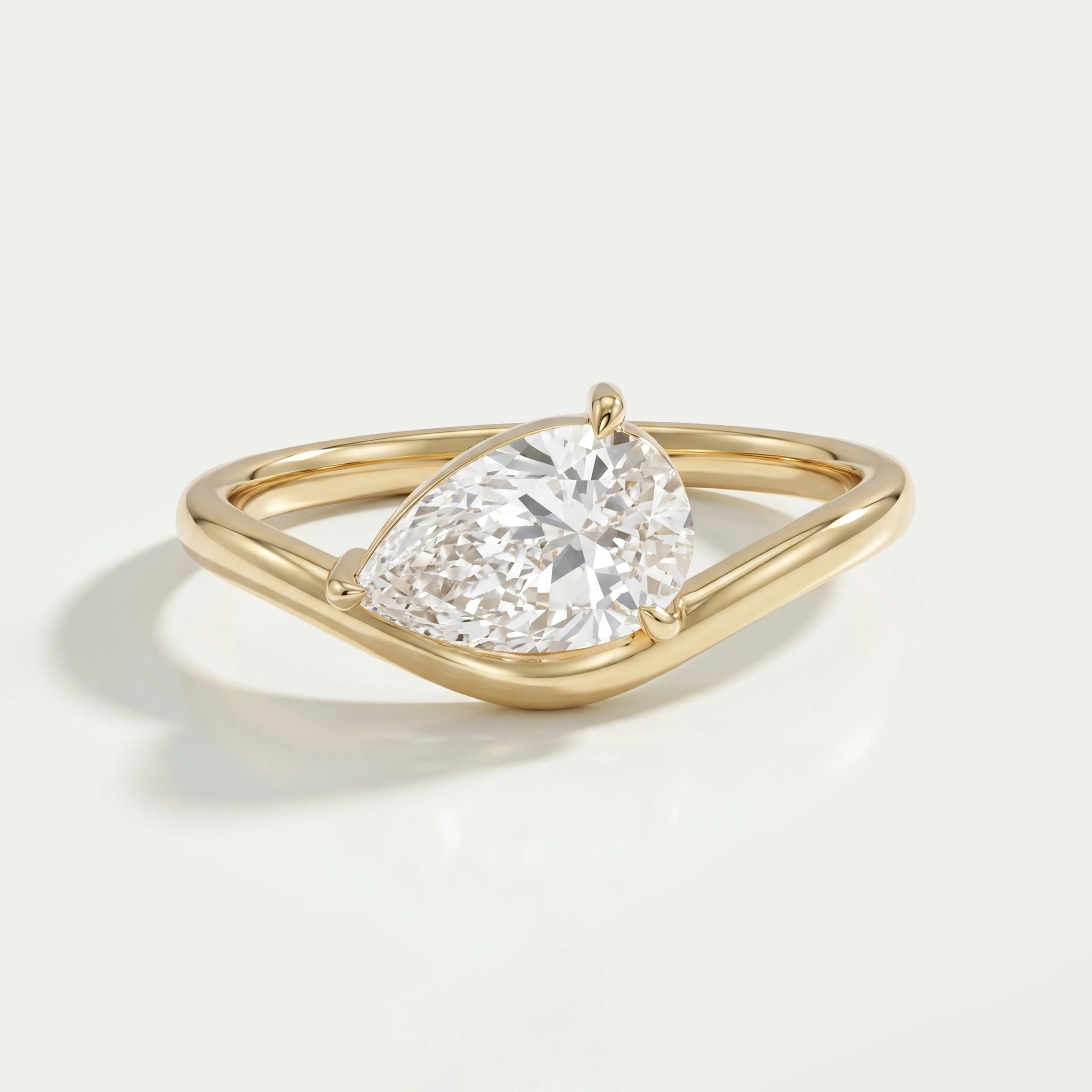 Pear Cut Lab Grown Diamond Curved Solitaire Ring