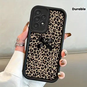 Stylish And Elegant Leopard Print Bow Pattern Phone Case for Galaxy S24/S24 FE/S24 Ultra/S24 Plus/S23/S23 Ultra/S22 Ultra/S21/S21 Fe/S20/A55/A54/A53/A52/A35/A34/A33/A32/A25/A24/A23/A15/A14/A13/A05S, Shockproof, Durable, And Visually Appealing.