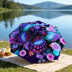 Portable folding umbrella The umbrella features a large, vibrant butterfly surrounded by colorful flowers and foliage. Suitable for daily travel use, holiday Gift