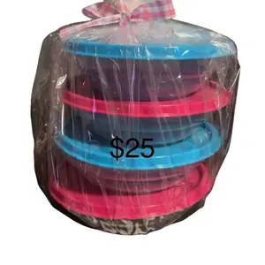 Tupperware - Stack of Assorted Colors with Ribbons, $25