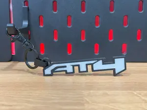 GMC Glow in the Dark Key Chain Set of 2 - AT4 Logo Keychain for Truck Owners Durable Lightweight Car Accessories Off-Road Gear Gift for Fans