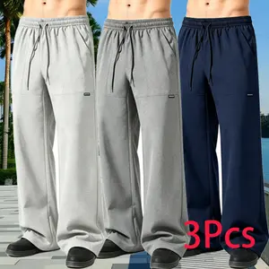 3-pack men’s loose casual pants with pockets and a drawstring, simple design suitable for all seasons.