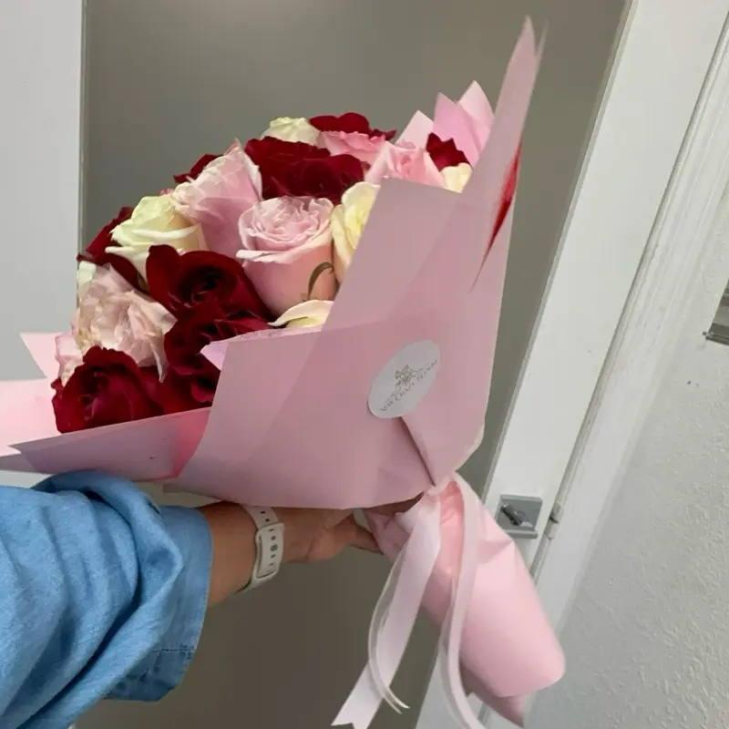 50 Mix Pink Red White Roses Bouquet with Elegant Pink Packaging and Ribbon Accents for Special Occasions