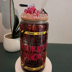 True crime lovers dream tumbler. Made from glass featuring a really cool blood dripping effect and comes with a crime scene decorated lid.