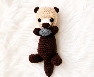 Handmade Crochet Sea Otter Plush Holding Rock