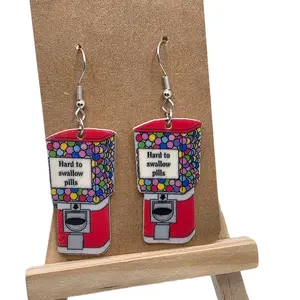 Hard to Swallow Pill Candy Machine Earrings with Colorful Design and Fun Text Humorous Hook Earrings for Any Occasion