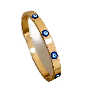 Evil Eye Bangle Bracelet - Elegant Design with Blue Accents and Smooth Finish