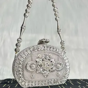 Desi Elegant Women's Fancy Handmade Metal Brass Clutch with Beaded Handle and Intricate Embellishments