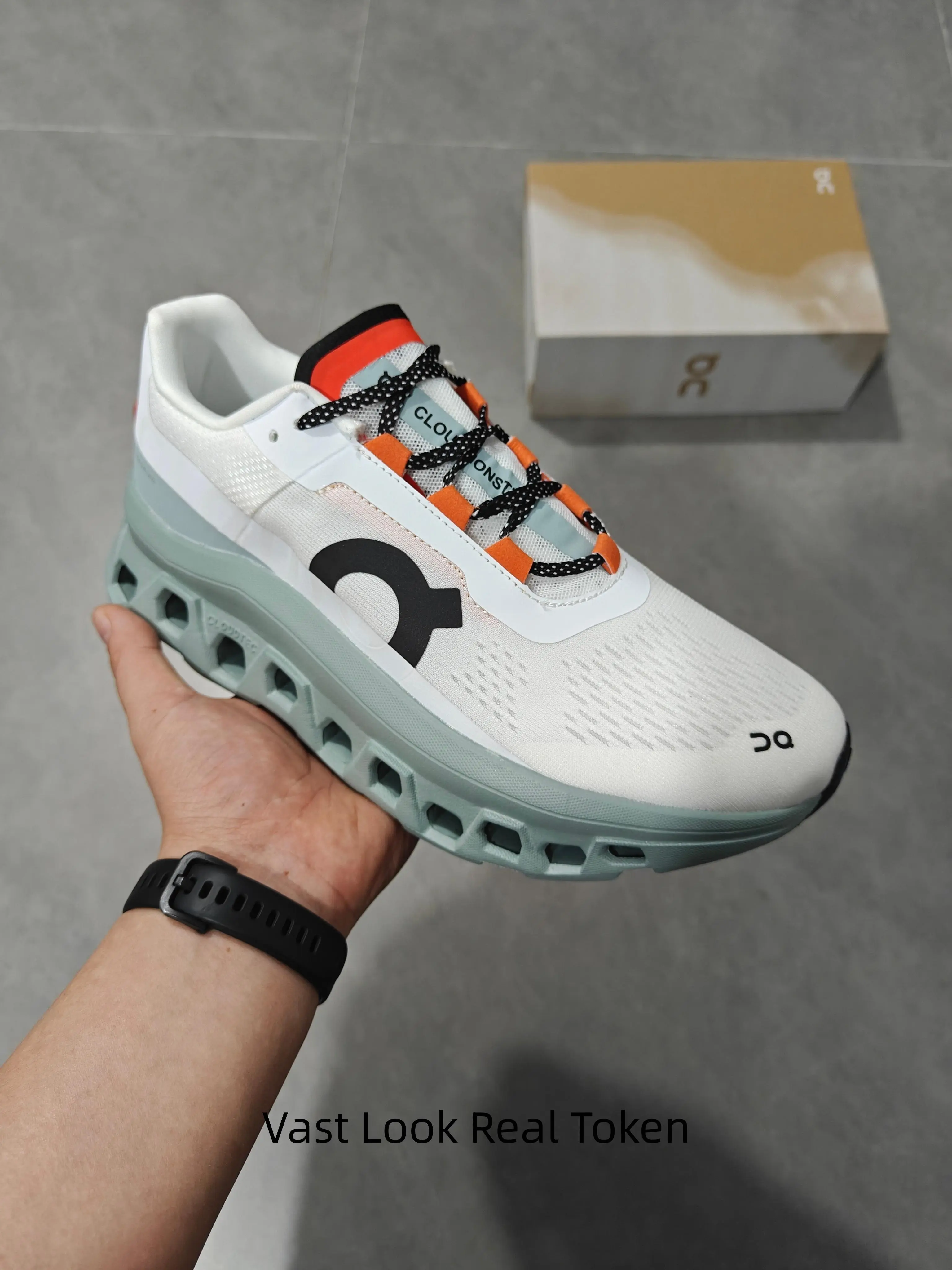 Multicolor casual running shoes fit all genders. Hollow honeycomb outsole cuts weight, bright orange lace details, complete original box attached.