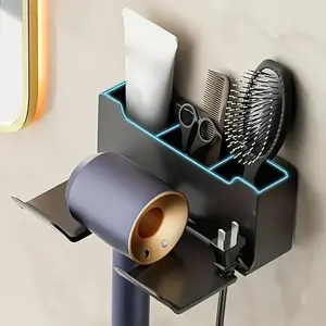 This hair dryer holder perfectly solves the storage problem! 🛁 No drilling required for installation, easily adheres to bathroom walls! It can hold hair dryers, combs and various other tools! #BathroomStorageEssential #HairCareTips