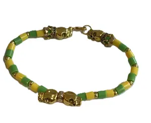 Ilde of Orula from Canutillo - Ifá and Santería Protection Bracelet - Green and Yellow Gala Bracelet with Safety Clasp and Gold Skulls - Handmade Lucumí Religious Jewelry