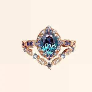 Vintage Oval 1.5 ct Alexandrite Engagement Ring Set in 18k Rose Gold with Blue Sapphire Accents – Dainty Curved Band, Stackable Promise Ring, June Birthstone Jewelry, Bridal Set, Anniversary Gift, Matching Rings for Women