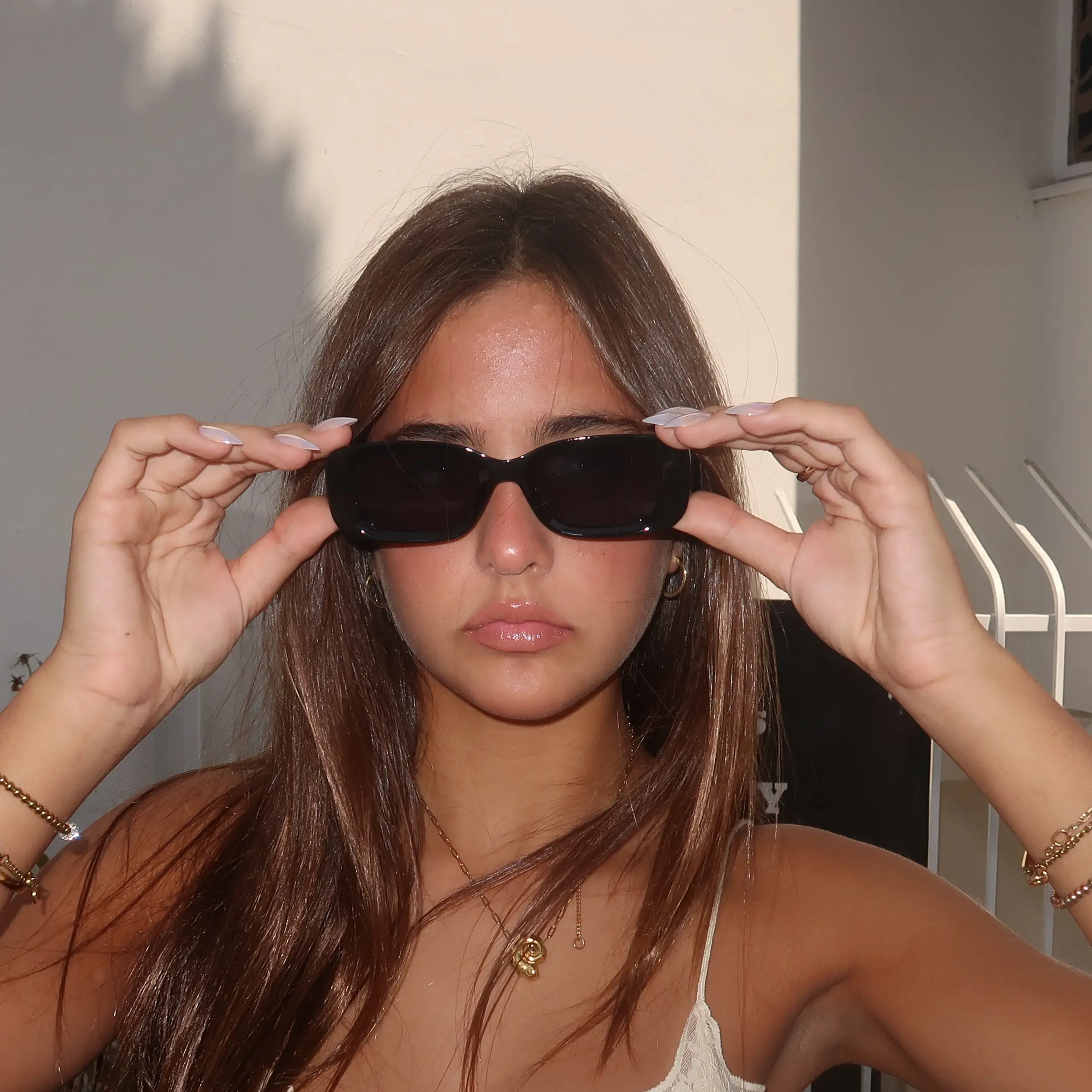 V BY VYE -  JOLENE - SHOP KAVEAH X V BY VYE Turn heads in our JOLENE sunglasses. A bold black square frame that commands attention while staying effortlessly chic. With full UV protection and a sleek, modern design, these sh ades elevate any look