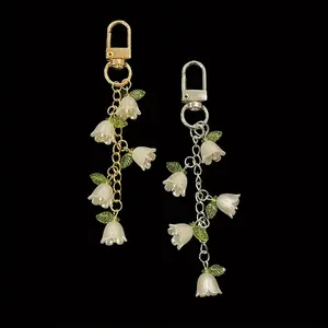 Elegant Orchid Tassel Keychain Resin Plant Theme Charm for Bags Backpacks and Car Keys Perfect Gift for Women Pendant Beaded Fashion Carabiner Jewellery