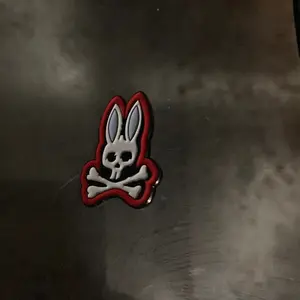 Psycho Bunny pin