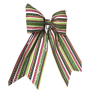 Large fabric Bow for wreaths, Doors and Decor in this fun holiday fabric.  Reinforced with interfacing to hold the perfect shape.