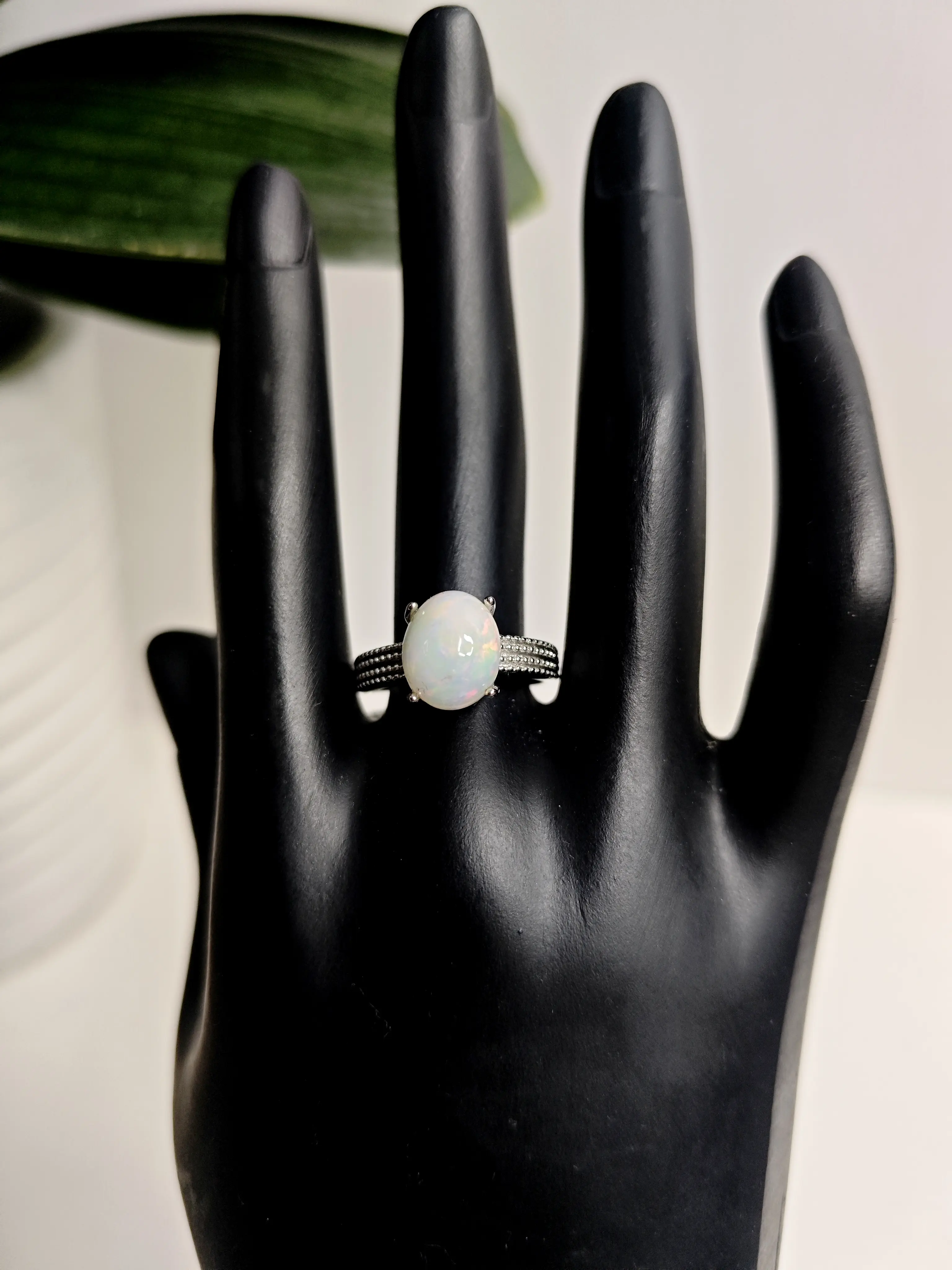 Raya(12280)gc.Opal Dream Ring - Oval Rainbow Opal in Textured Silver Setting with Four-Claw Prongs
