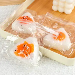 2026 New Egg Yolk Squishy Toy - Food-Safe Silicone Stress Ball, Kawaii Rice Ball Popping Fidget Sensory Toy for Anxiety & Focus