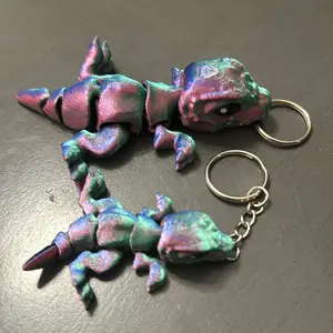 Tiny T-Rex flexi fidget keychain