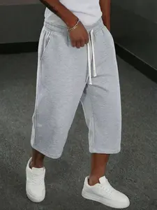 Men’s summer loose straight-leg three-quarter jogger pants with an elastic drawstring waistband, made from skin-friendly, breathable knit fabric—ideal for casual wear, sports, home, commuting, and everyday outfits.