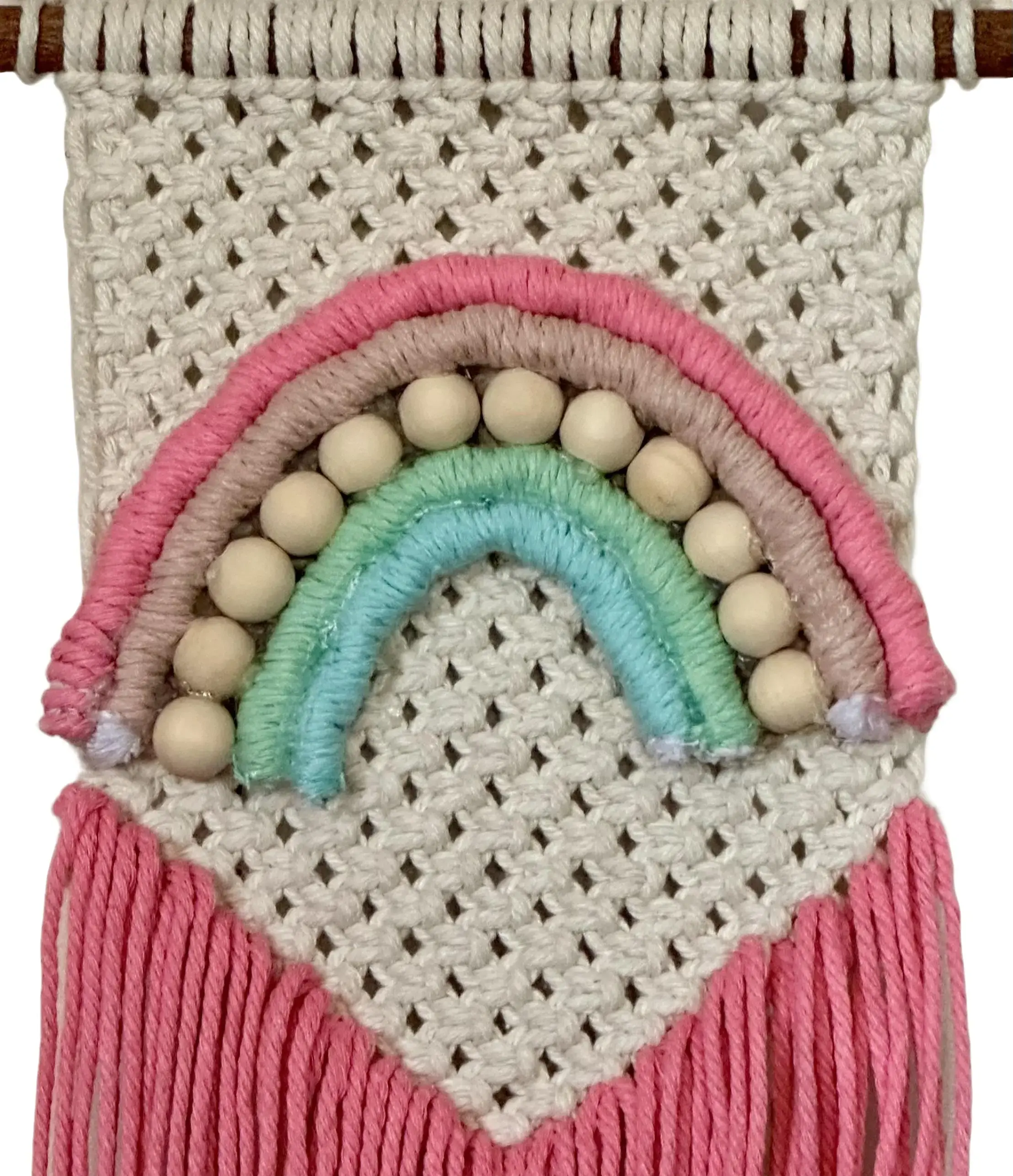 Pink macrame rainbow wall hanging