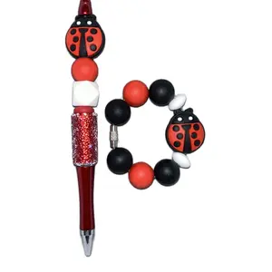 Ladybug pen and cup charm set