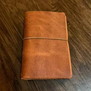 Handmade pocket size leather travel journal