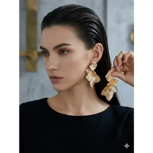 Trending Sculptural Gold Leaf Flower Earrings |   Vintage Aesthetic Statement Jewelry for Women |   Boho Chic Large Studs for Spring Outfits