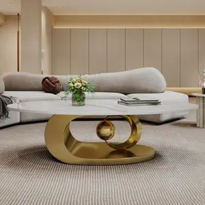 Bellemave  Marble Coffee Table with Sculptural Stainless Steel Base .The design of this table is both beautiful and practical, including adjustable leveling feet that achieve perfect stability, ensuring that it complements any modern avant-garde interior.