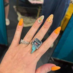 Coors Rings with Decorative Stones and Colorful Designs