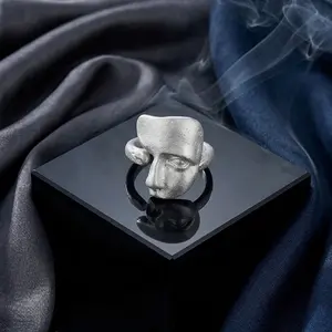 The Silent Gaze Avant-Garde Minimalist Face Ring with Smooth Matte Silver Finish and High-Relief Anatomical Design for Bold Individuals