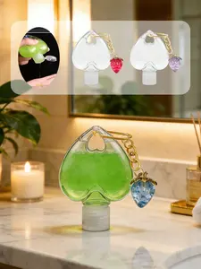 50ML Heart-Shaped Buckle Empty Bottle with Strawberry Pendant, Portable Flip-Top Bottle, Reusable Cosmetic Container, Travel Size