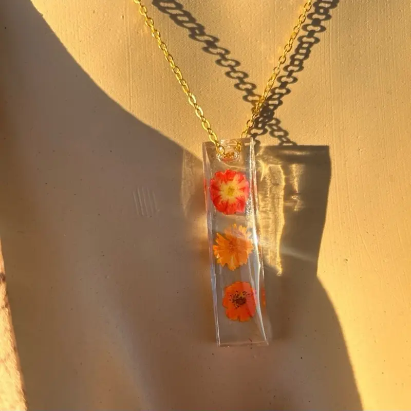 Handmade Resin Necklace with Floral Pendants, Chain Design, and Clear Resin Accents
