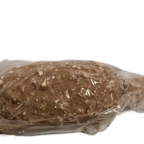D-CRUJIDOS Clay piece with caolin dumm and tiza jupiter. In a form of paleta. Made in Mexico