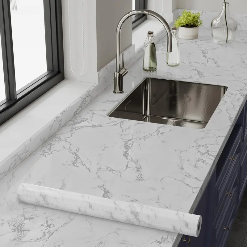 Marble patterned waterproof and self adhesive wallpaper featuring a heat resistant and oil proof PET film is easy to clean with a simple wipe Convenient to install it is ideal for decorating kitchens bedrooms and living rooms