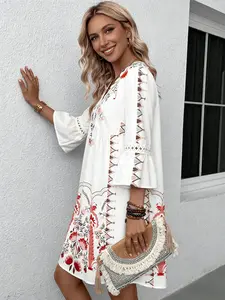 A women's printed V-neck lace spliced bell-sleeve high-waisted casual versatile dress, suitable for summer, daily casual wear, vacations, and loungewear.
