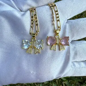 Bow Necklace with Chain - Gold-Tone Design Featuring Bow Charms and Chain Details