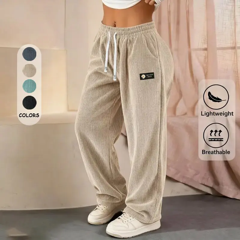 Women’s fashion corduroy wide-leg floor-length pants with a mid-rise elastic drawstring waist; lightweight, breathable, and drapey straight-leg design. Tag detailing; versatile casual women’s pants for home and outings, suitable for everyday wear and back