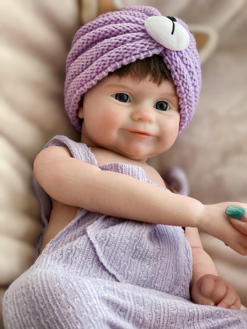 18-inch Rebirth Doll Full Body Soft Silicone Realistic Newborn Girl Doll with Purple Cat Ears Clothes Accessories Perfect Christmas Gift for Collections Holidays Birthdays Halloween Suitable for Children Over 3 Yearsold