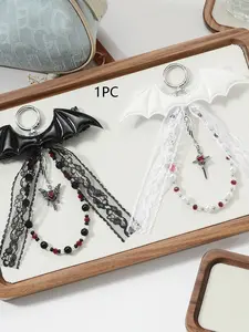 Niche design sense of fashion simple bat wings lace ribbon beaded cross key chain pendant, simple exquisite  personality classic versatile black and white contrast suitable for daily bag matching, small gifts.