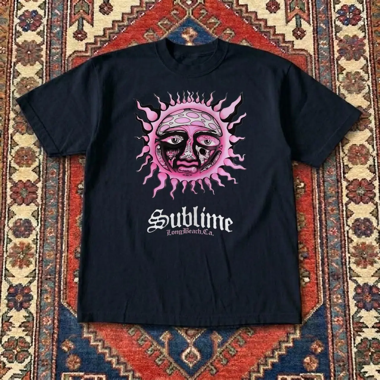 Black Sublime band tee with pink sun graphic featuring a face T-shirt