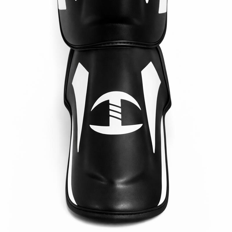 Invicto Sports MMA Shin & Instep Guards, Rexine Leather Construction, Multi-Layer EVA Padding, Adjustable Velcro Strap, Black & White, for Training & Sparring