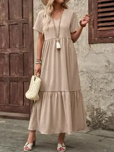 A women's fashionable khaki textured patchwork lotus leaf edge length dress, suitable for commuting to work, shopping and outdoor activities, indoor and outdoor wear