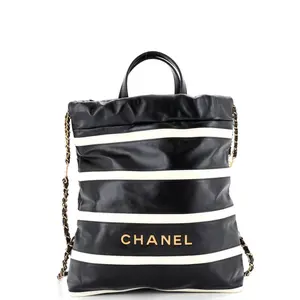 Pre-owned CHANEL Leather Backpacks 22 Chain Backpack Striped Shiny Calfskin Medium by Rebag