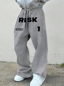 Unisex "RISK" Typography Casual Baggy Sweatpants Bottom Viral CleanFit Streetwear Y2K Aesthetic Premium Fleece Blend Bold Black Graphic Typography Print Adjustable Drawstring Ultra-Relaxed Baggy Fit Edgy Streetwear OOTD