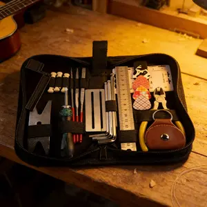 26-in-1 Guitar All-in-One Repair Tool Kit, a professional instrument care set, essential for guitar adjustment and maintenance.