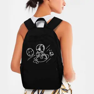 Casual Backpack Featuring an Astronaut on a Rocket Print, Designed for Teenagers. It Is Lightweight with a Large Capacity, Adjustable Straps, Made from Black Nylon Fabric