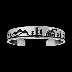 Sterling silver Mountain Man cuff bracelet with Moose and Mountain Cabins