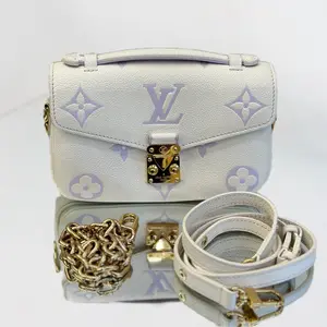 Pre-owned Leather Crossbody Bags Louis Vuitton Pochette Métis East West in Monogram Empreinte White/Lilac