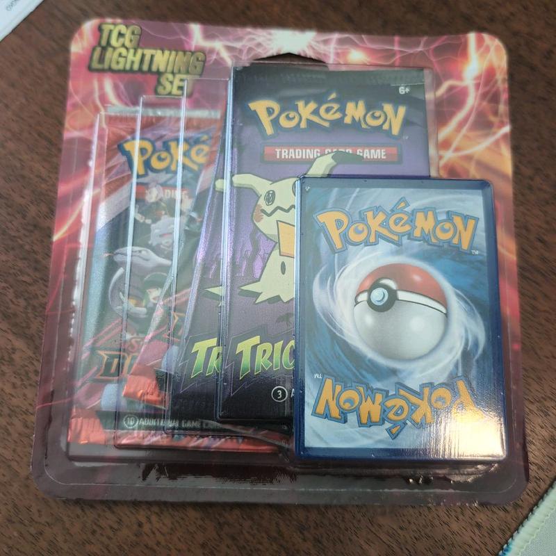 Pokemon TCG Lightning Set - Includes Trading Card Game Cards & Collectible Poké Ball - Official Pokemon Brand